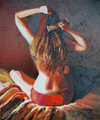 woman combing her hair